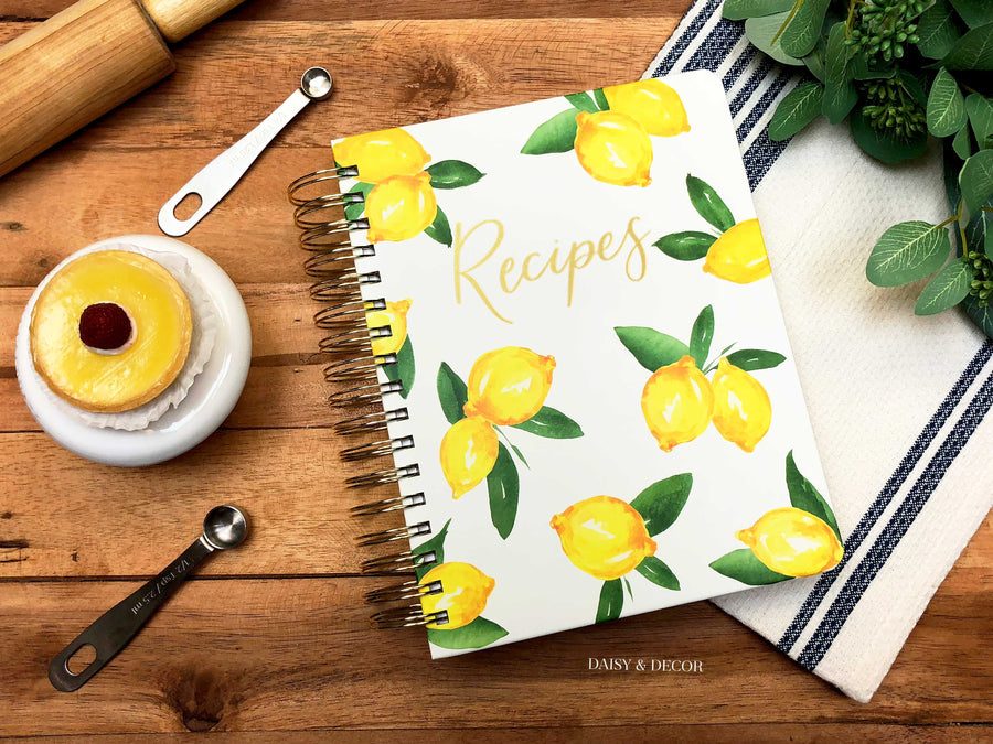 Lemons Keepsake Recipe Journal  Organize all of your recipes in this vibrant lemon print spiral-bound book. Inside features separate categories for different courses, along with side tabs for easy access to each section!